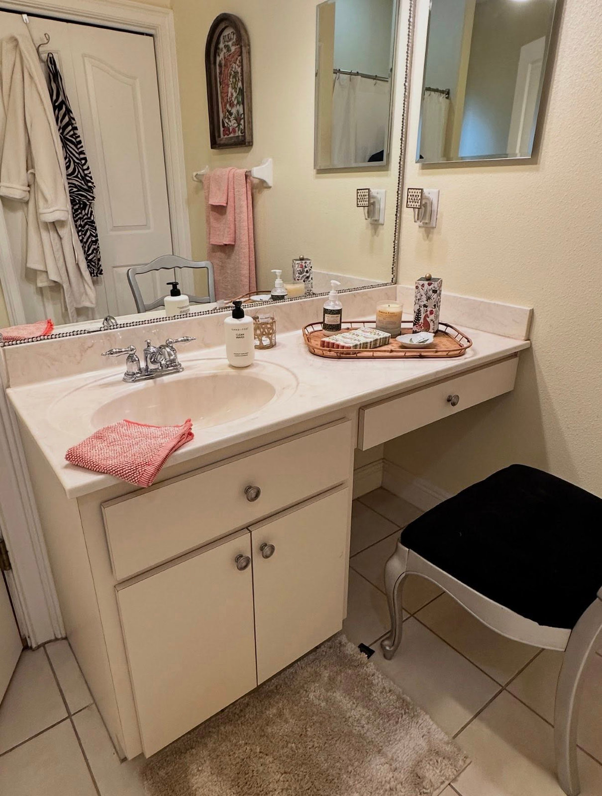 Dated bathroom vanity with cultured marble top before remodel